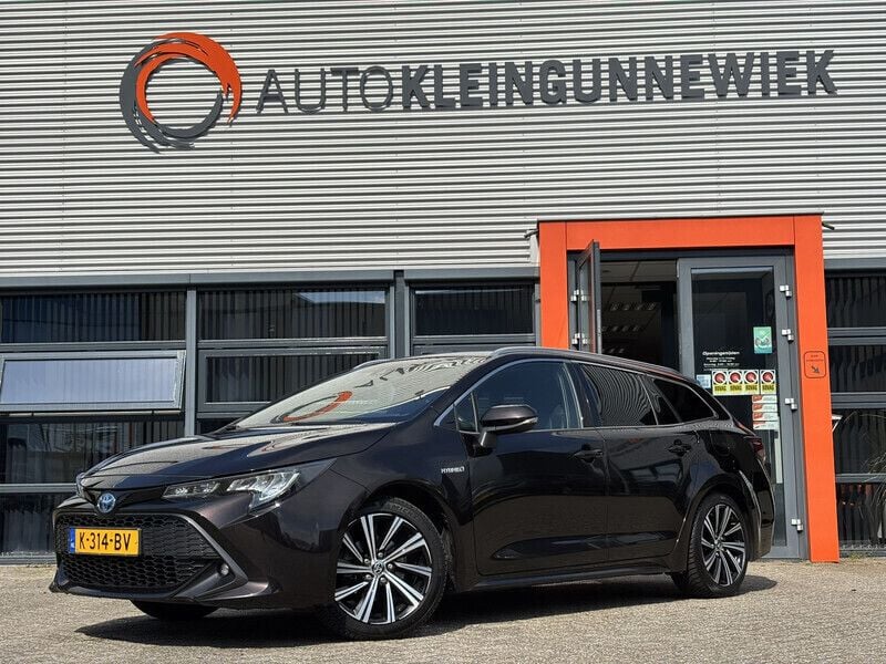 Bruin Gebruikt 2021 Toyota Corolla Business Edition Stationwagen | € 17.950 (Eerlijke prijs) - Afbeelding 1/4
