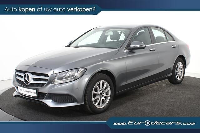 Grijs, metallic lak Gebruikt 2017 Mercedes C180 Premium Plus Sedan | € 16.800 (Super prijs) - Afbeelding 1/4