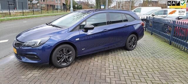 Blauw Gebruikt 2021 Opel Astra Elegance Stationwagen | € 15.999 (Eerlijke prijs) - Afbeelding 1/4