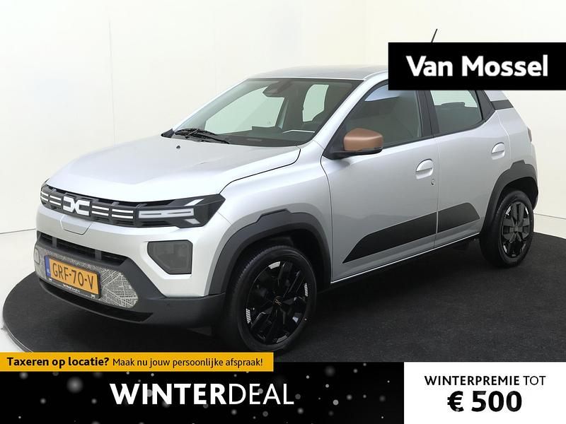 Grijs Occasion 2024 Dacia Spring Extreme Hatchback | € 14.940 (Eerlijke prijs) - Afbeelding 1/4