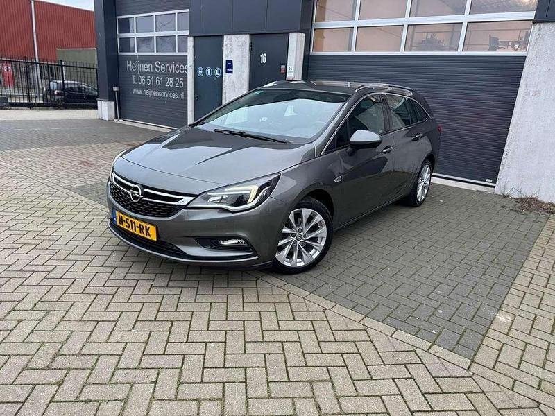 Grijs Gebruikt 2018 Opel Astra Innovation Stationwagen | € 9.350 (Goede deal) - Afbeelding 1/4