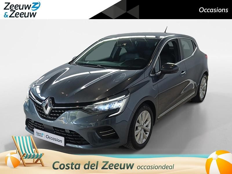 Gris titanium kpn (donker grijs) Gebruikt 2021 Renault Clio V Intens Hatchback | € 19.895 (Eerlijke prijs) - Afbeelding 1/4