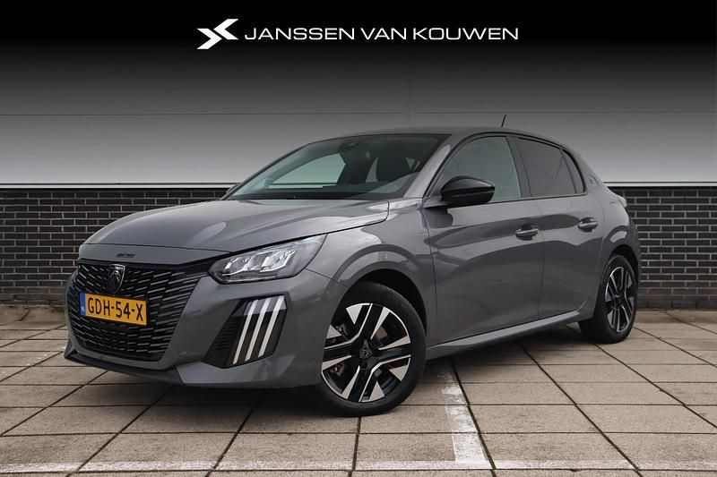 Grijs Gebruikt 2024 Peugeot e-208 Style Hatchback | € 21.845 (Eerlijke prijs) - Afbeelding 1/4