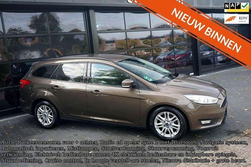 Bruin Gebruikt 2018 Ford Focus Trend Stationwagen | € 11.940 (Goede deal) - Afbeelding 1/4