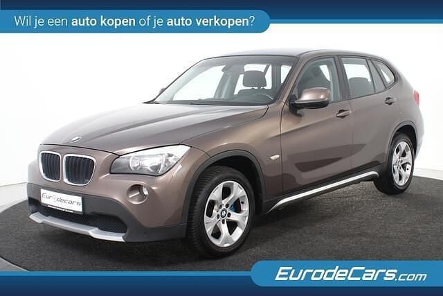 Bruin Occasion 2010 BMW X1 Executive SUV | € 7.980 (Eerlijke prijs) - Afbeelding 1/4