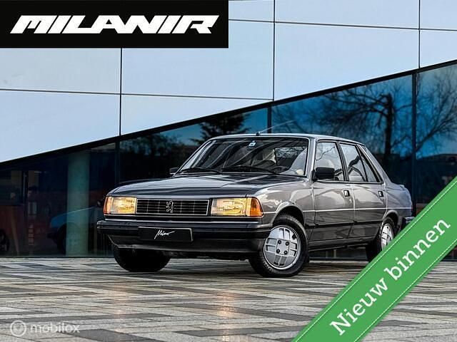 Grijs Gebruikt 1987 Peugeot 305 Sedan | € 10.945 - Afbeelding 1/4