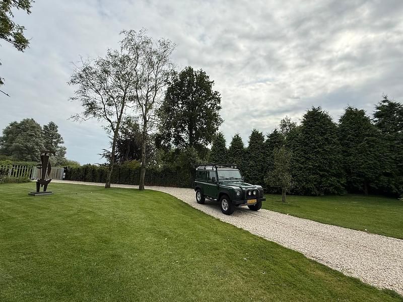 Groen (mat) Gebruikt 2003 Land Rover Defender SE Stationwagen | € 26.895 (Super prijs) - Afbeelding 1/4