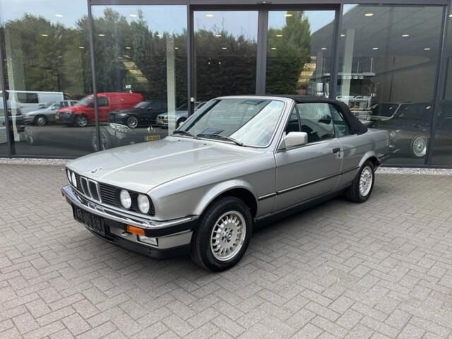 Grijs Occasion 1987 BMW 325 Cabriolet | € 27.500 - Afbeelding 1/4