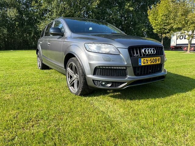 Grijs (metallic) Gebruikt 2013 Audi Q7 Proline SUV | € 21.490 (Eerlijke prijs) - Afbeelding 1/4