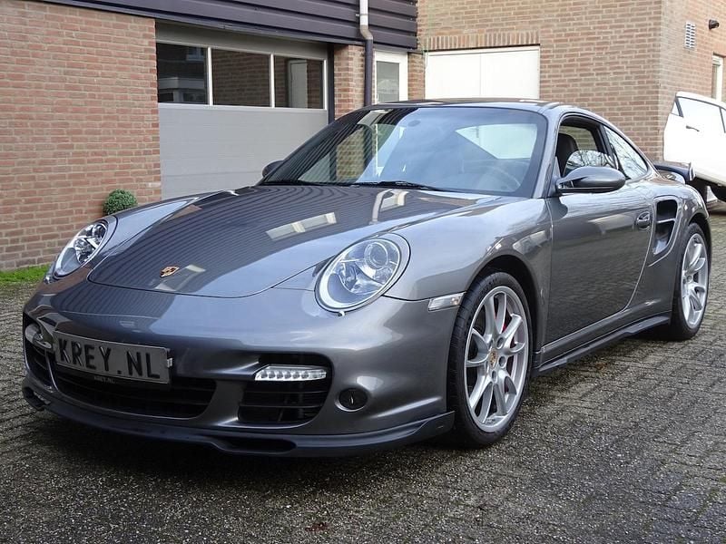 Grijs (metallic) Occasion 2007 Porsche 997 Coupé | € 77.950 - Afbeelding 1/4