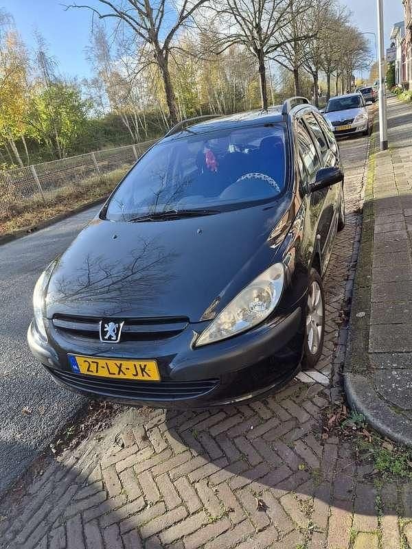 Zwart Gebruikt 2003 Peugeot 307 Stationwagen | € 1.000 (Eerlijke prijs) - Afbeelding 1/4