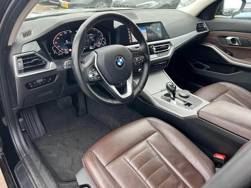 Occasion BMW 320e Sport Line 204 PK (150 kW) 2021 Zwart Stationwagen