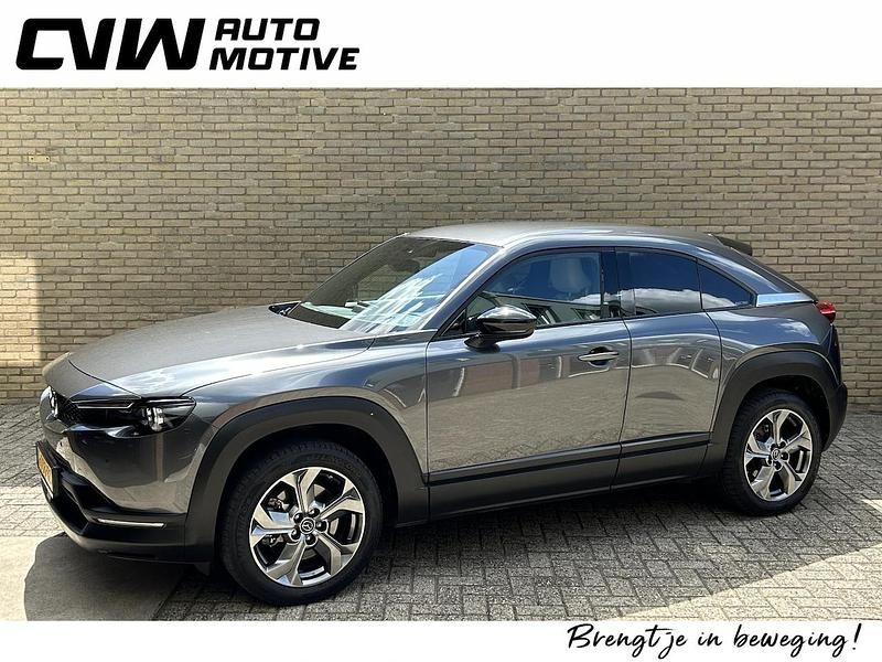 Grijs (metallic) Gebruikt 2021 Mazda MX30 Luxury SUV | € 14.400 - Afbeelding 1/4