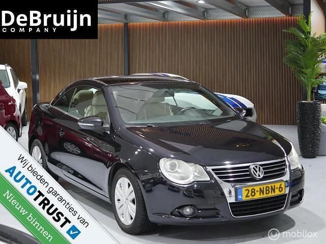 Zwart Gebruikt 2010 VW Eos Highline Cabriolet | € 5.450 (Goede deal) - Afbeelding 1/4