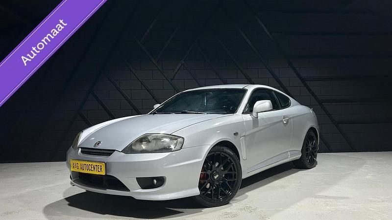 Grijs Gebruikt 2004 Hyundai Coupé Sport Coupé | € 5.995 (Eerlijke prijs) - Afbeelding 1/4