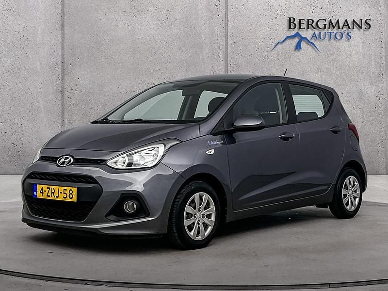 Grijs Gebruikt 2015 Hyundai i10 Comfort Hatchback | € 6.800 (Eerlijke prijs) - Afbeelding 1/4