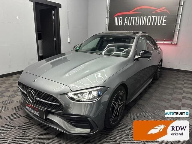 Grijs Gebruikt 2021 Mercedes C300 AMG line Sedan | € 53.950 - Afbeelding 1/4