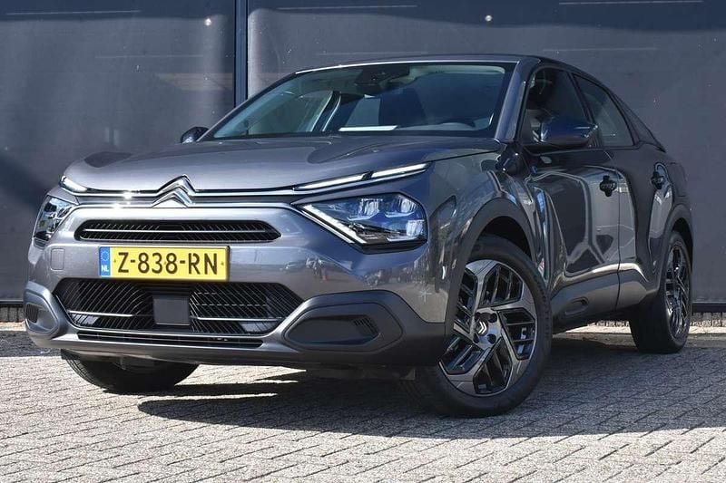 Grijs Gebruikt 2024 Citroën e-C4 SUV | € 20.400 (Eerlijke prijs) - Afbeelding 1/4