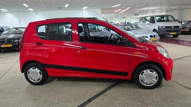Occasion Daihatsu Cuore 69 PK (50 kW) 2008 Rood Hatchback