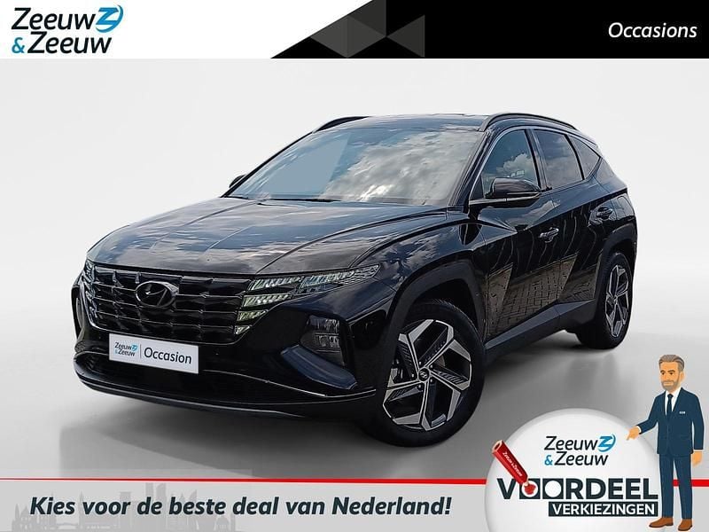 Abyss black metallic (a2b) Gebruikt 2024 Hyundai Tucson Comfort SUV | € 35.940 (Goede deal) - Afbeelding 1/4
