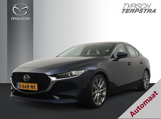 Deep crystal blue (blauw metallic) Gebruikt 2019 Mazda 3 Comfort Sedan | € 19.950 (Eerlijke prijs) - Afbeelding 1/4