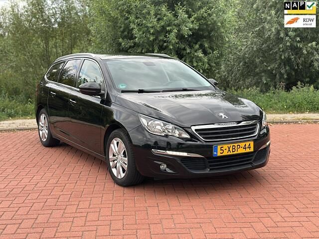 Zwart Gebruikt 2014 Peugeot 308 Stationwagen | € 4.999 (Eerlijke prijs) - Afbeelding 1/4