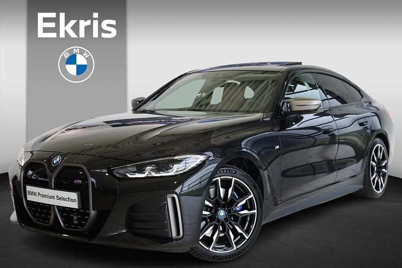 Zwart Gebruikt 2023 BMW i4 Comfort Edition Sedan | € 53.900 (Goede deal) - Afbeelding 1/4