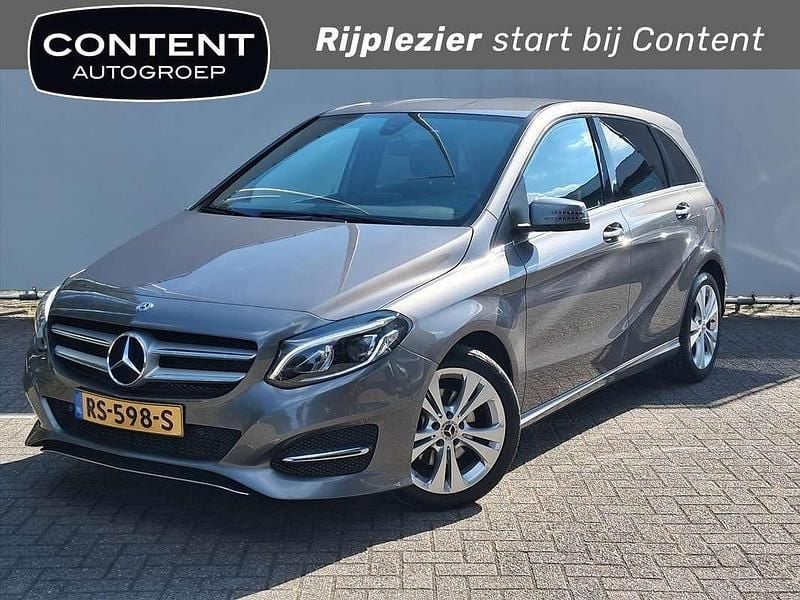 Grijs Gebruikt 2018 Mercedes B180 Ambition MPV | € 19.440 (Goede deal) - Afbeelding 1/4