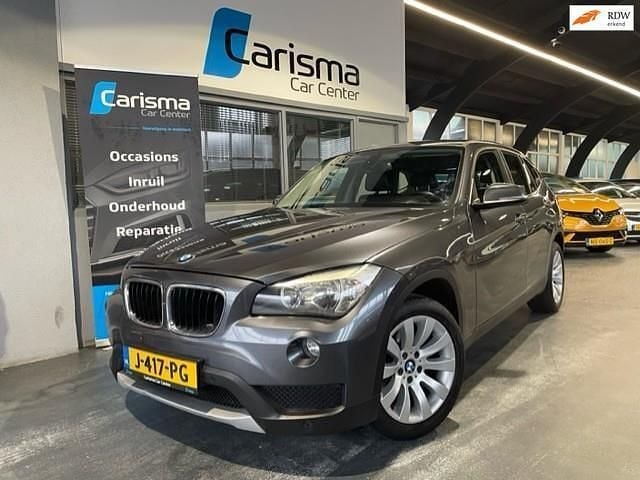 Grijs Gebruikt 2013 BMW X1 SUV | € 11.945 (Goede deal) - Afbeelding 1/4