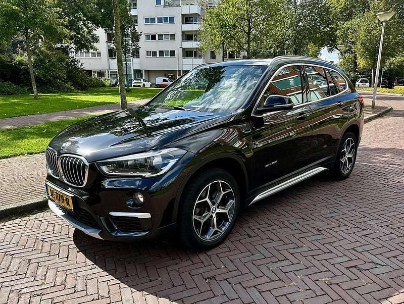 Zwart Gebruikt 2016 BMW X1 Executive SUV | € 17.950 (Eerlijke prijs) - Afbeelding 1/4