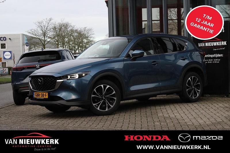 Blauw Gebruikt 2024 Mazda CX-5 Exclusive-Line SUV | € 39.900 (Eerlijke prijs) - Afbeelding 1/4