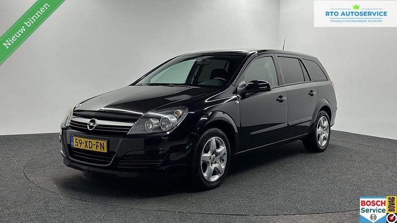 Zwart Gebruikt 2007 Opel Astra Stationwagen | € 2.500 (Eerlijke prijs) - Afbeelding 1/4