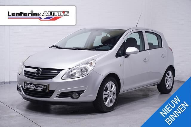 Grijs Gebruikt 2010 Opel Corsa Edition Hatchback | € 3.766 (Eerlijke prijs) - Afbeelding 1/4