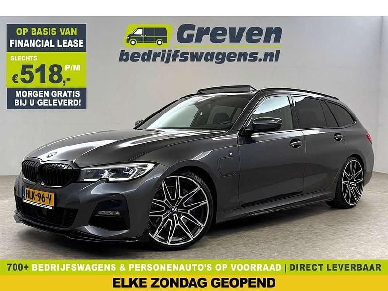 Grijs (metallic) Gebruikt 2020 BMW 330e Executive Stationwagen | € 31.900 (Duur) - Afbeelding 1/4