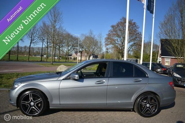 Grijs Gebruikt 2009 Mercedes C180 Sedan | € 8.999 (Eerlijke prijs) - Afbeelding 1/4