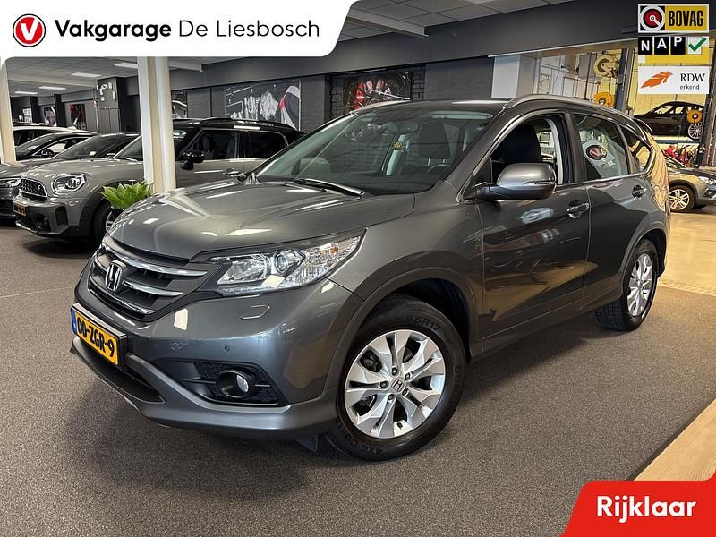 Grijs, metallic lak Gebruikt 2013 Honda CR-V Elegance SUV | € 13.450 (Eerlijke prijs) - Afbeelding 1/4