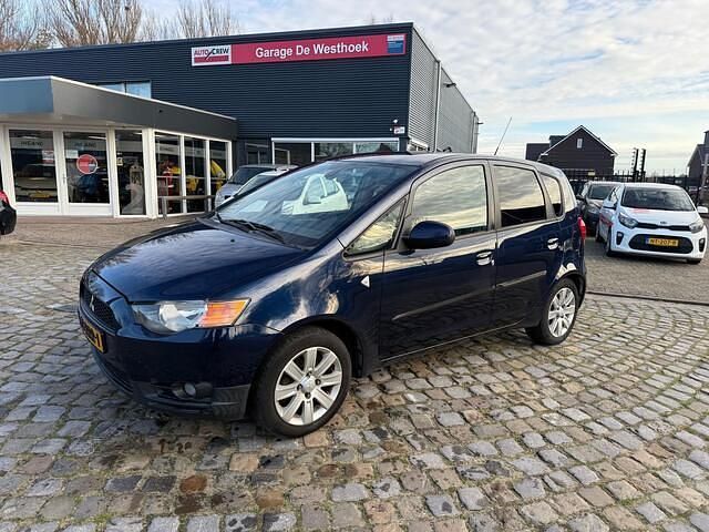 Blauw (metallic) Gebruikt 2011 Mitsubishi Colt Edition Hatchback | € 3.950 (Eerlijke prijs) - Afbeelding 1/4