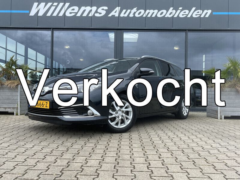 Grijs Gebruikt 2016 Toyota Auris Hybrid Executive Stationwagen | € 14.950 (Goede deal) - Afbeelding 1/4
