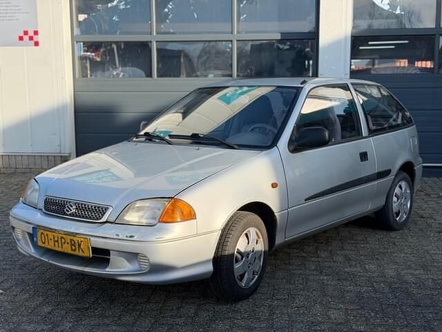 Occasion Suzuki Swift 86 PK (63 kW) 2001 Grijs Hatchback