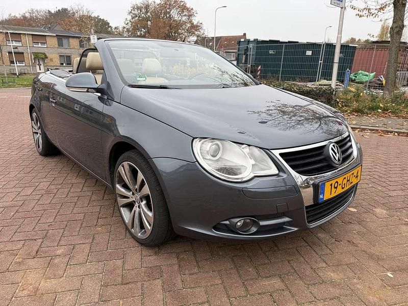 Grijs Gebruikt 2008 VW Eos Highline Cabriolet | € 4.950 (Goede deal) - Afbeelding 1/4