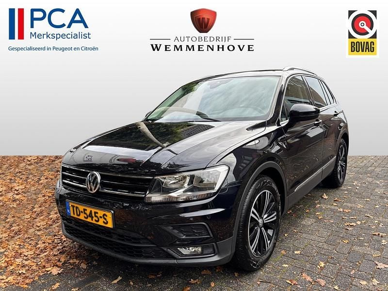 Zwart Gebruikt 2018 VW Tiguan Comfortline SUV | € 19.795 (Goede deal) - Afbeelding 1/4