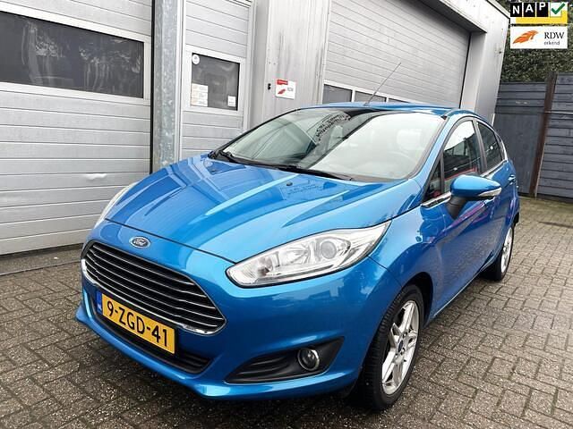 Blauw (metallic) Occasion 2015 Ford Fiesta Titanium Hatchback | € 3.995 (Super prijs) - Afbeelding 1/4