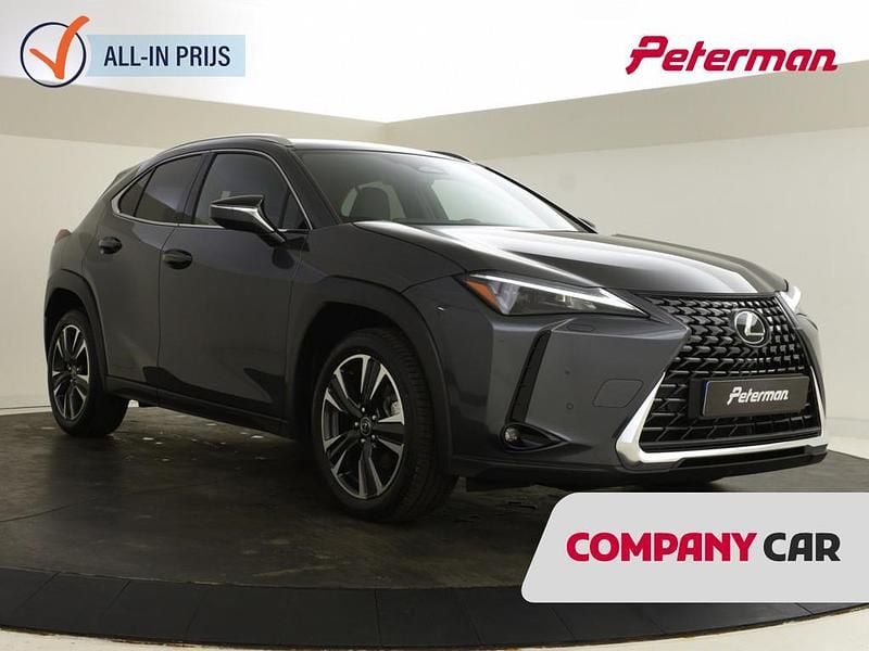Grijs, metallic lak Occasion 2025 Lexus UX 300h Business Edition SUV | € 42.499 - Afbeelding 1/4