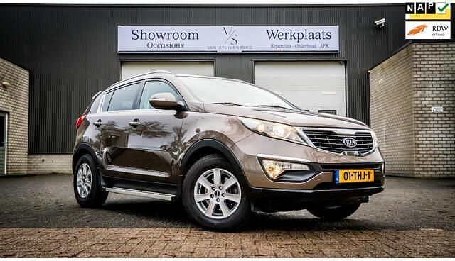 Bruin Occasion 2012 Kia Sportage Plus SUV | € 10.500 (Eerlijke prijs) - Afbeelding 1/4