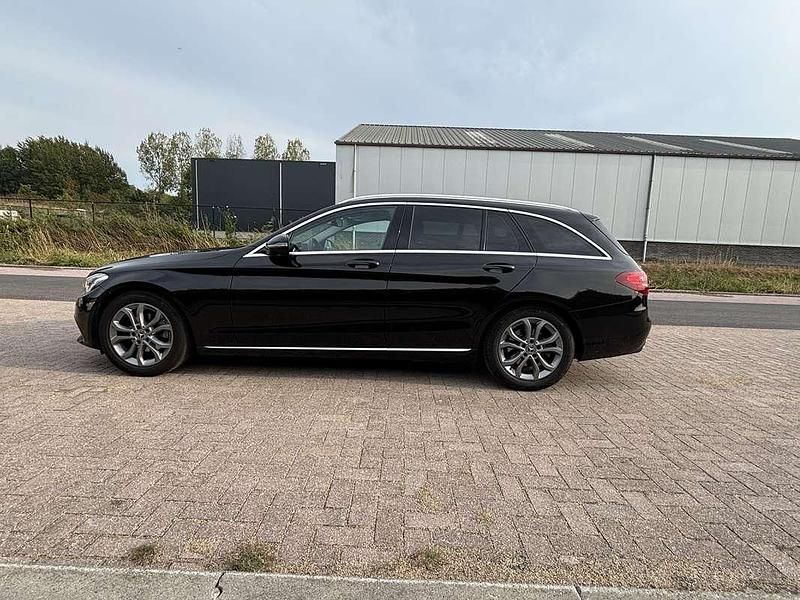 Zwart Gebruikt 2017 Mercedes C180 Business Stationwagen | € 18.000 (Goede deal) - Afbeelding 1/4