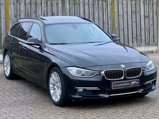 Occasion BMW 330 Luxury Line 257 PK (189 kW) 2013 Zwart Stationwagen