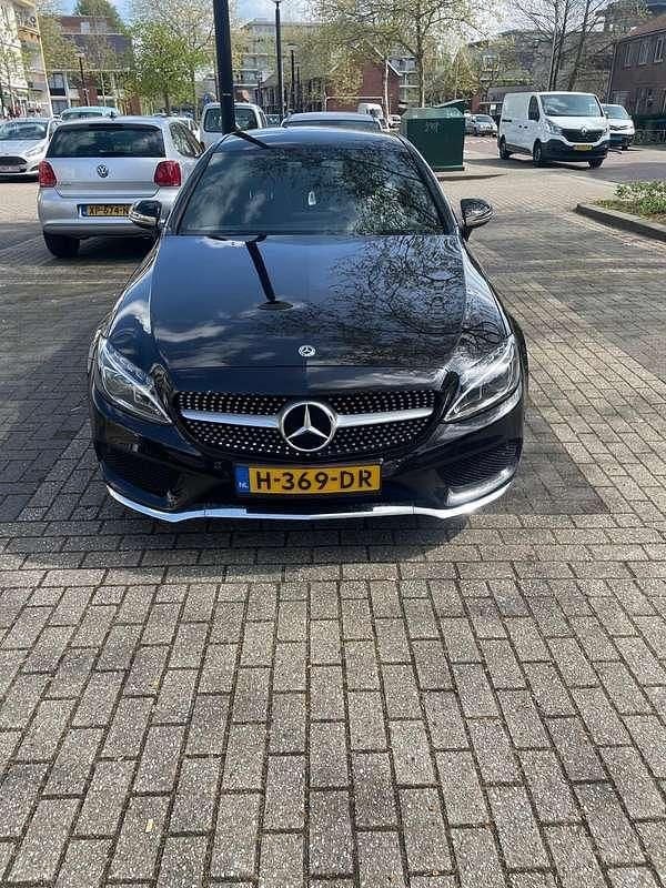 Zwart Occasion 2017 Mercedes C180 Premium Plus Coupé | € 21.000 (Eerlijke prijs) - Afbeelding 1/4