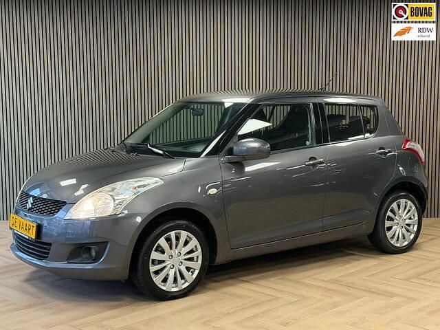 Grijs Occasion 2011 Suzuki Swift Exclusive Hatchback | € 6.995 (Eerlijke prijs) - Afbeelding 1/4