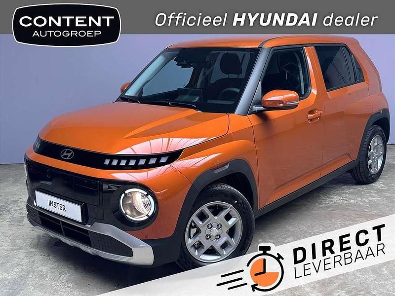 Oranje parelmoer Nieuw 2025 Hyundai Inster Hatchback | € 26.990 - Afbeelding 1/4