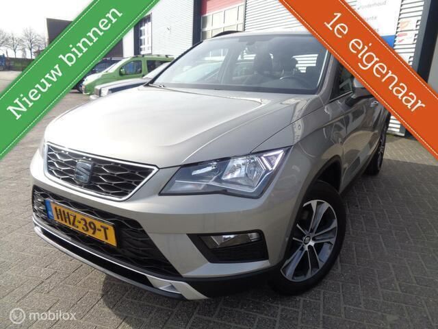 Grijs, metallic lak Gebruikt 2017 Seat Ateca Style SUV | € 17.250 (Eerlijke prijs) - Afbeelding 1/4